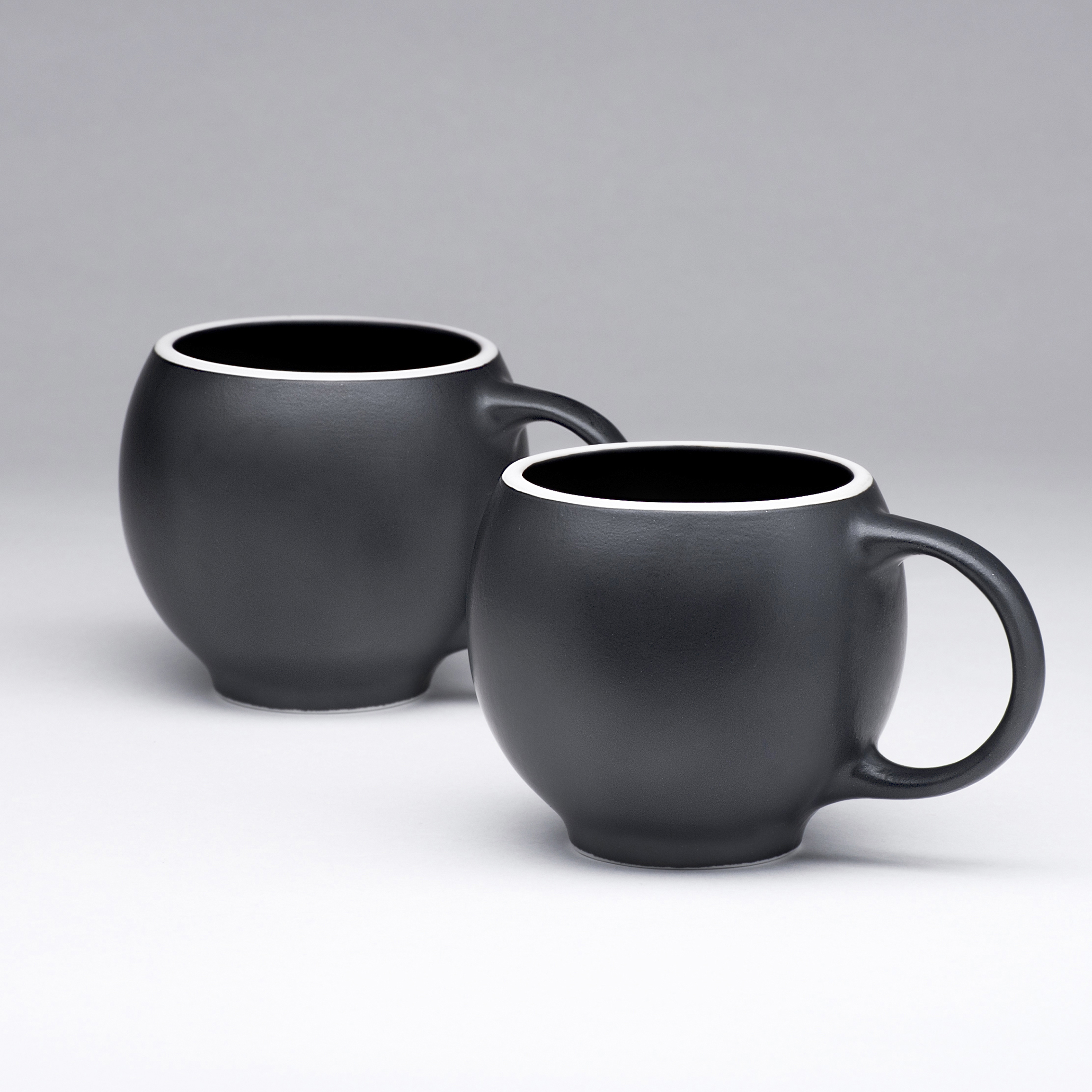 EVA_teacups_black