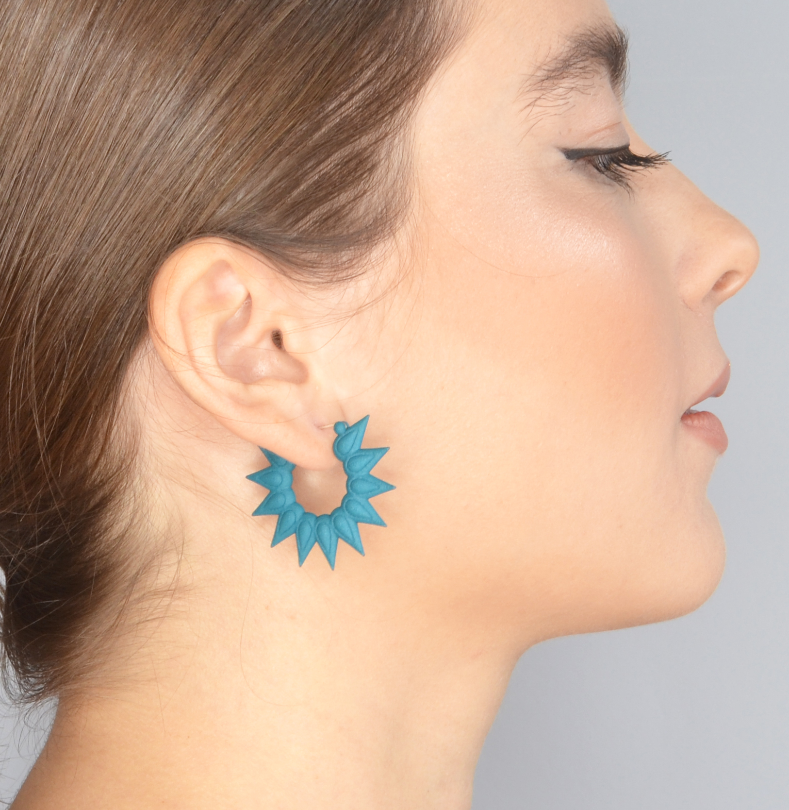 dark teal hoops on Tam