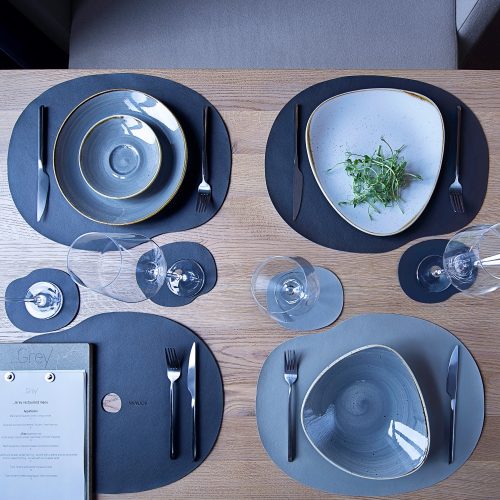 Black leather place mat