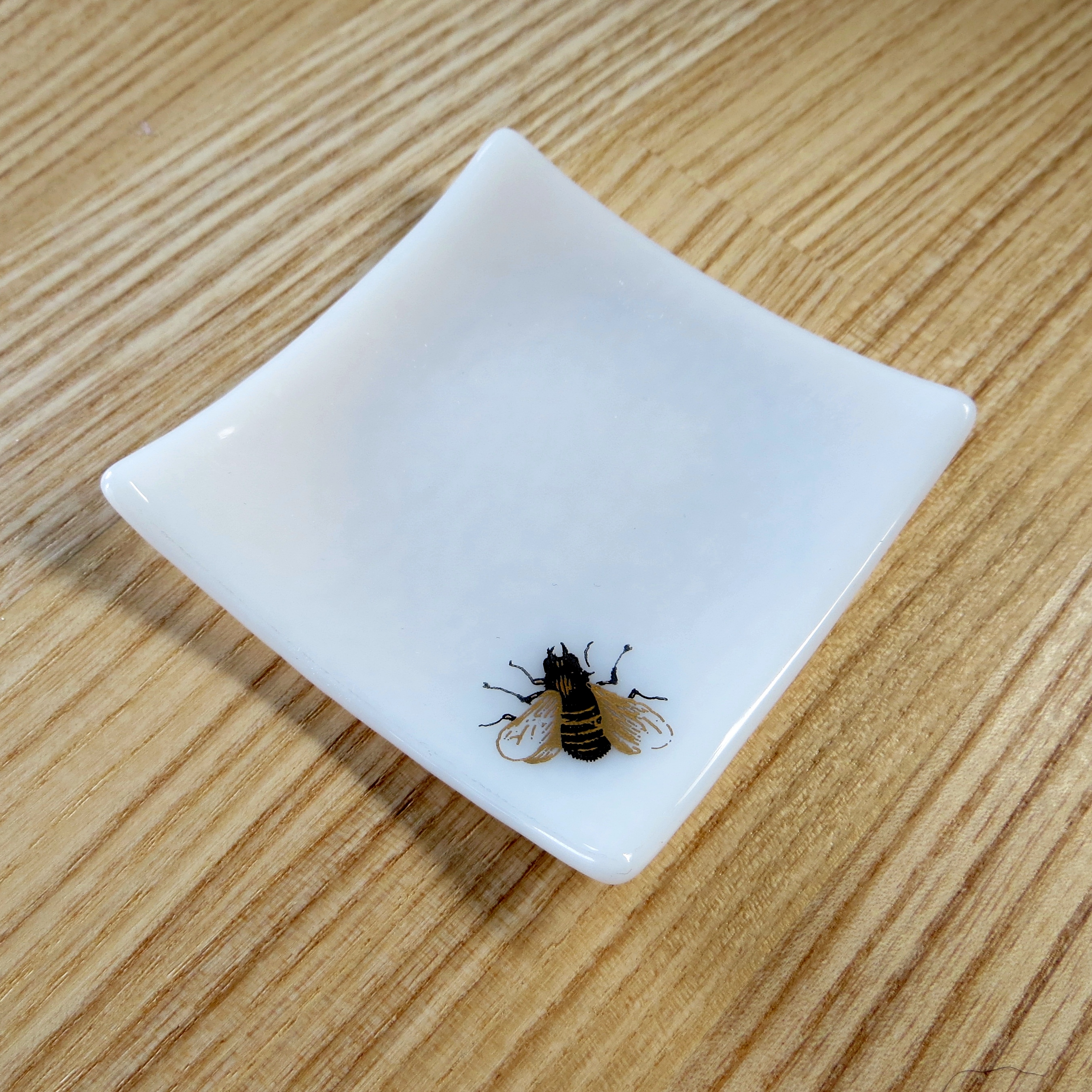 White and gold bee fused glass ring dish White and gold bee fused glass ring dish