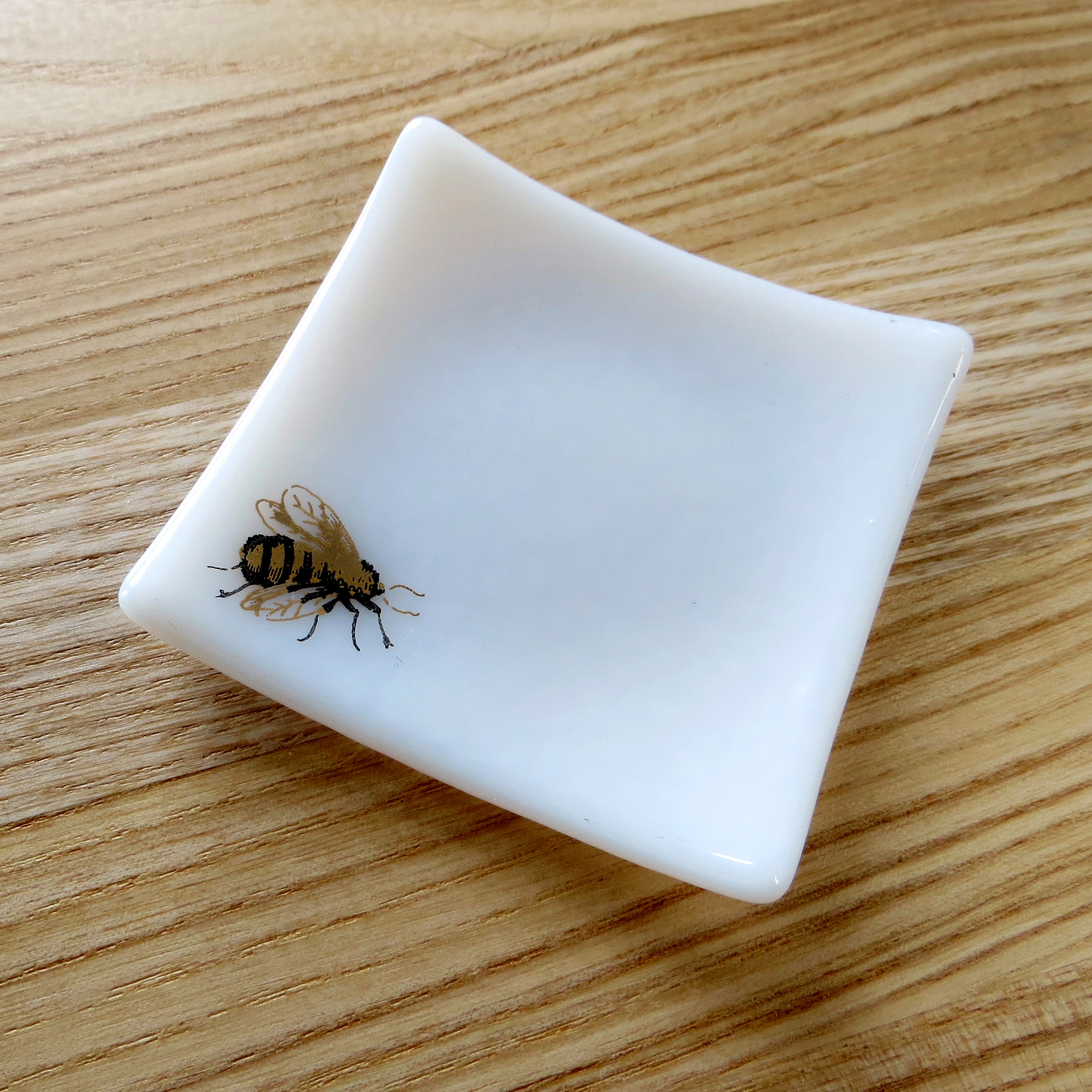 White and gold bee fused glass ring dish White and gold bee fused glass ring dish
