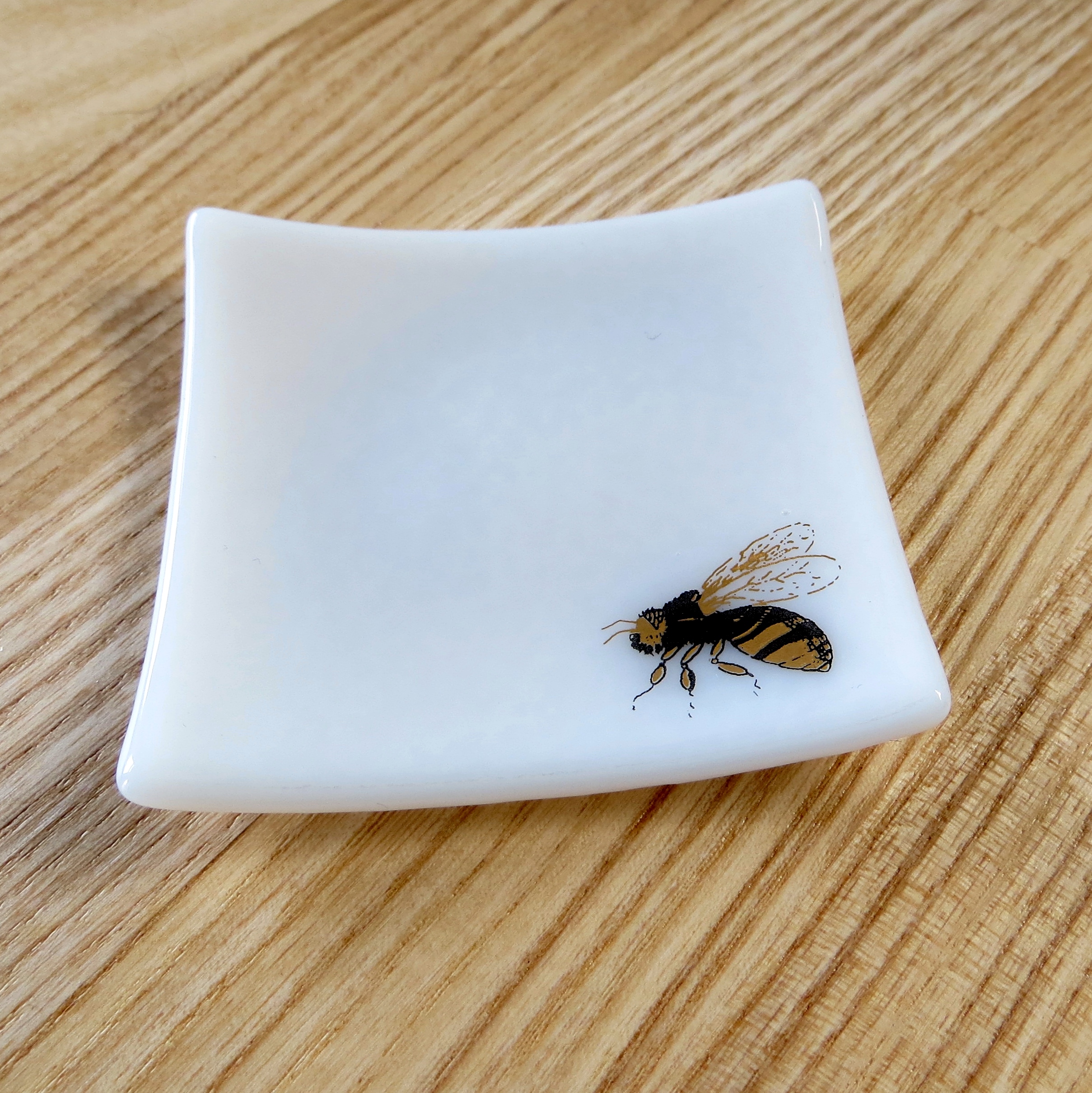 White and gold bee fused glass ring dish White and gold bee fused glass ring dish