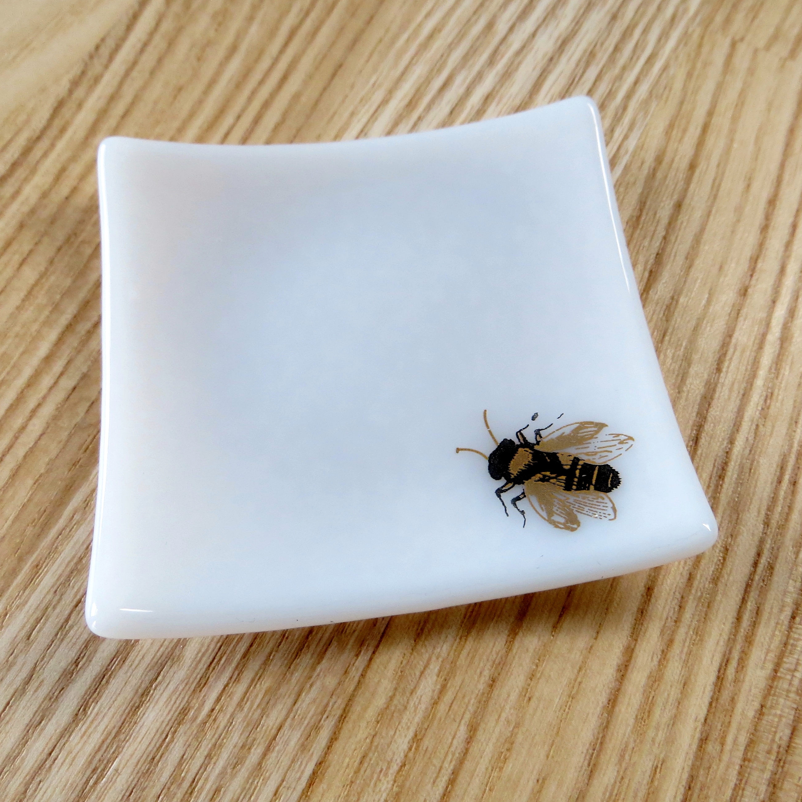 White and gold bee fused glass ring dish White and gold bee fused glass ring dish