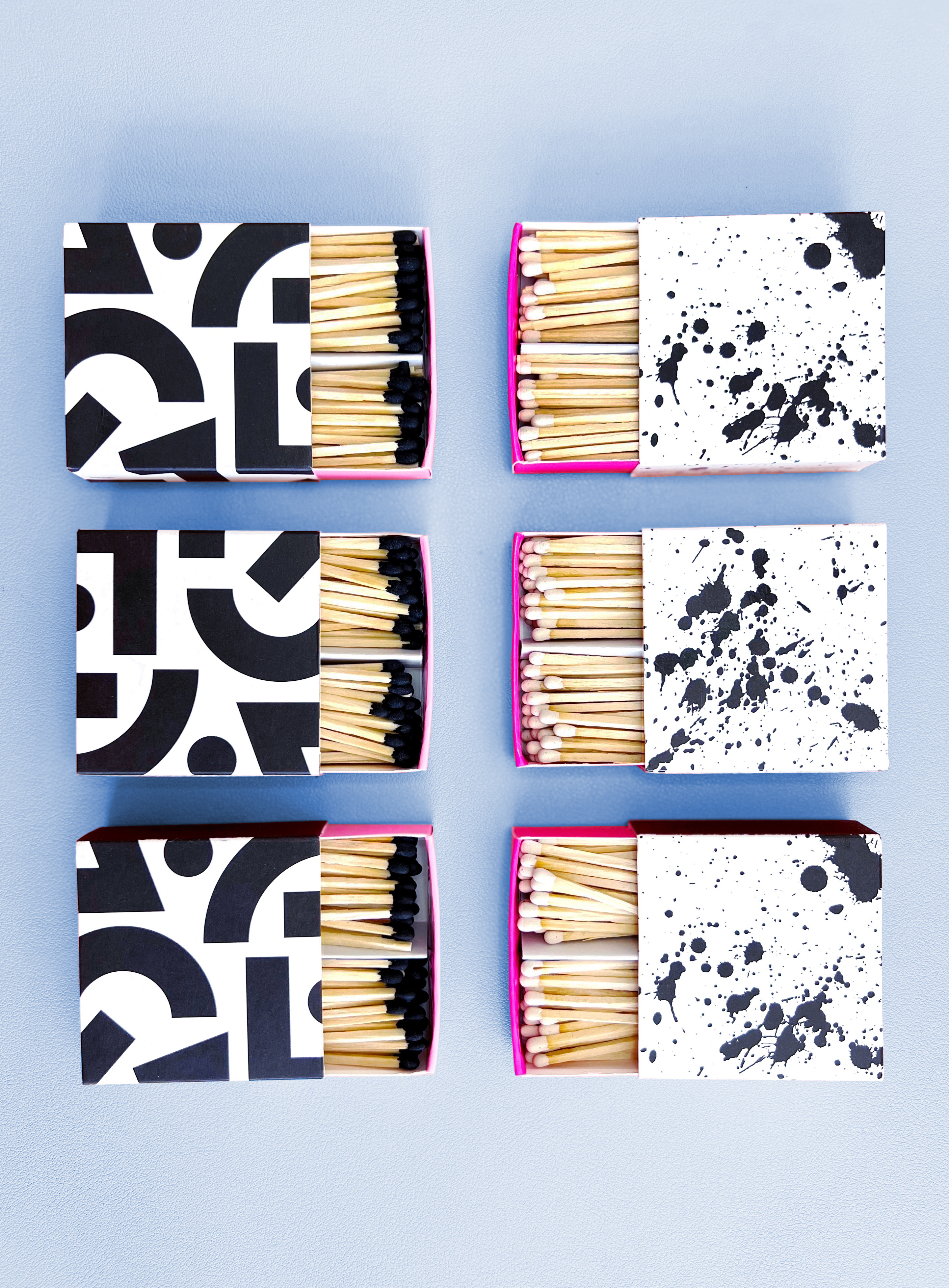 Match Boxes Black and White on Purple