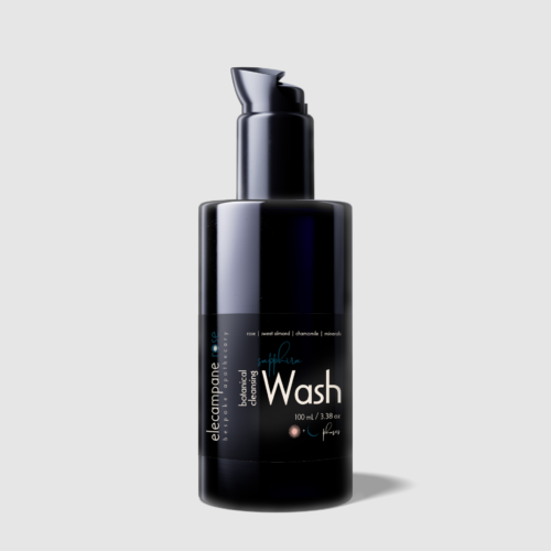black glass bottle with cleansing wash
