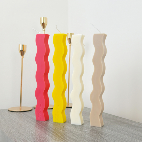 Colourful wavy pillar candle with a geometric design, perfect dinner table candles!