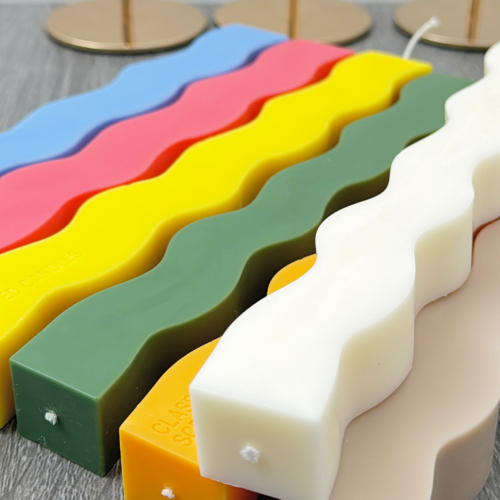 Colourful wavy pillar candle with a geometric design, perfect dinner table candles!