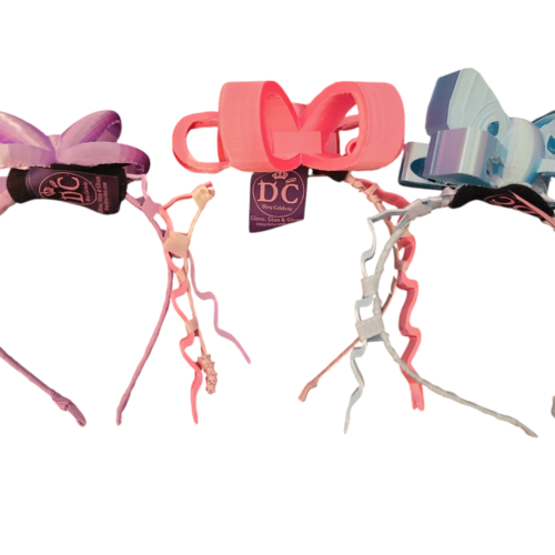 Set of three 3D printed bows in purple, pink and blue