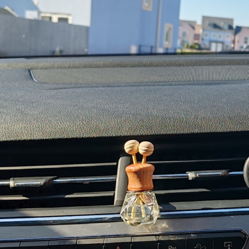 Moonlight Desire air freshener hanging inside a car – romantic and dreamy scent accessory for your drive