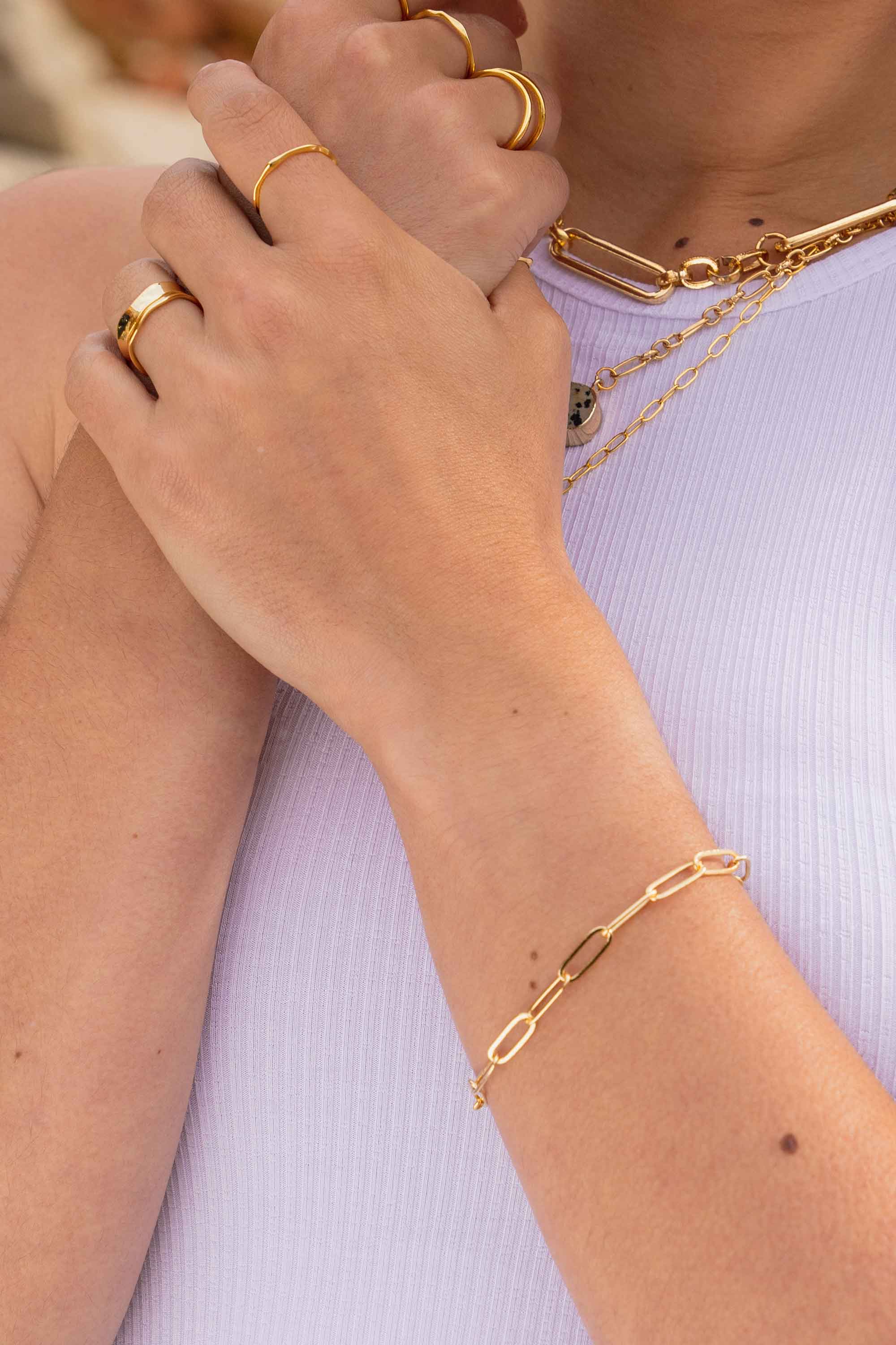 11347986-gold-paperclip-modern-classic-chain-bracelet-on-body-close-2.jpg