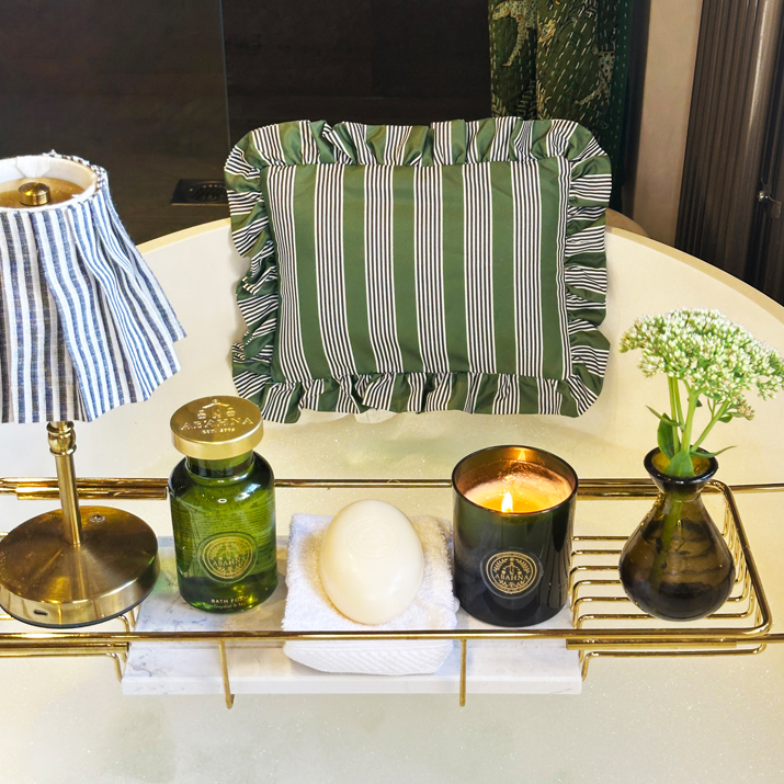 green_pillow_on_bath